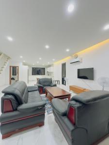 Predel za sedenje v nastanitvi Golden Palm Apartment with overlooking view