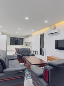 Predel za sedenje v nastanitvi Golden Palm Apartment with overlooking view
