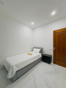 Postelja oz. postelje v sobi nastanitve Golden Palm Apartment with overlooking view