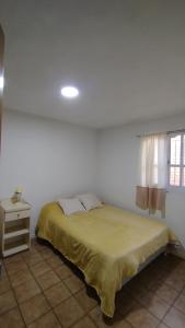 Postel nebo postele na pokoji v ubytování Microcentro San Rafael