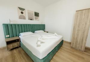 Krevet ili kreveti u jedinici u okviru objekta Hotel Floga