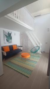 Posezení v ubytování Lumineux Duplex SANDÌA