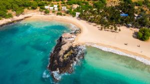 an aerial view of a beach and the ocean at Cozy apt amazing seaview - 2 min from beach - LCGR in Tarrafal