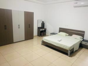 Ένα ή περισσότερα κρεβάτια σε δωμάτιο στο Bethesda