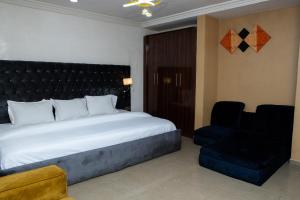 Rúm í herbergi á Mareot Hotel & Spa