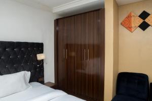 Rúm í herbergi á Mareot Hotel & Spa