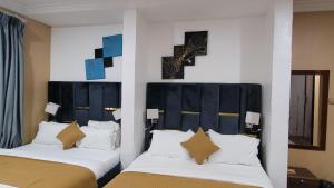Rúm í herbergi á Mareot Hotel & Spa