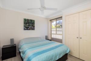 Postel nebo postele na pokoji v ubytování Pawprints