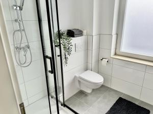 Koupelna v ubytování Ruhig wohnen mitten in der Stadt, 8 Min zum Hbf + 10 fotografií