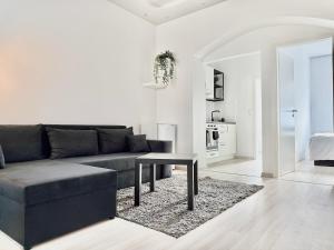 Posezení v ubytování Ruhig wohnen mitten in der Stadt, 8 Min zum Hbf