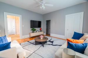 a living room with a couch and a table at 3BDR 2BA Downtown Salem with Parking in Salem