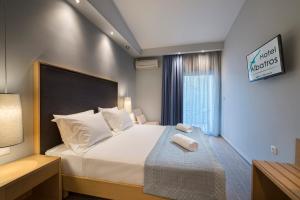 Postel nebo postele na pokoji v ubytování Albatros Hotel