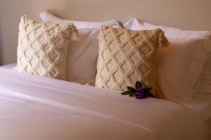 Cama ou camas em um quarto em Moã Charme Hotel - Mucugê