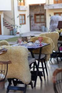 Uma área de estar em Moã Charme Hotel - Mucugê