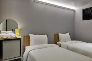 Giường trong phòng chung tại Half rest hostel Jongno Insa