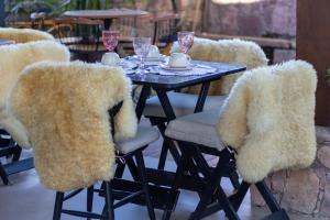Uma área de estar em Moã Charme Hotel - Mucugê
