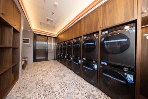 Gambar di galeri bagi Nostalgia S Hotel Beijing Qianmen Street & Tianqiao Performing Arts Center 时光漫步S酒店 北京前门天桥艺术中心店 Free fresh ground coffee,Free laundry service di Beijing +44 gambar