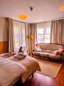 Een bed of bedden in een kamer bij Brú Country Estate