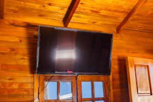 TV a/nebo společenská místnost v ubytování Cabaña Antonella by Renty + 20 fotografií