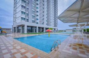 Πισίνα στο ή κοντά στο Homestay The Peak Condo