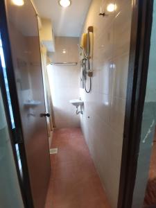 Koupelna v ubytování HOTEL BINTANG