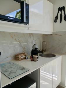 Cucina o angolo cottura di Au Nid de KLOE, plage & piscine
