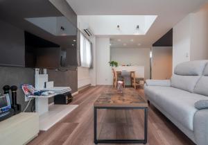 Un lugar para sentarse en 新屋 JR白石站徒步5分鐘 高速Wi-Fi 廁所x2 浴室x1 可停車2台 徒步可到超市