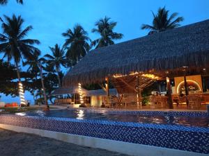 Bazén v ubytování OCEAN 9 siargao nebo v jeho okolí