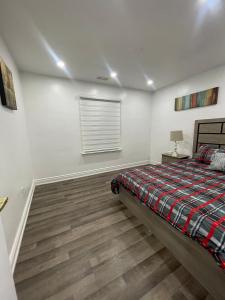 Ένα ή περισσότερα κρεβάτια σε δωμάτιο στο Three Bedroom Spacious Bangalow with Free Parking, closer to commercial area and highways