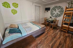 Postel nebo postele na pokoji v ubytování Apartmány u Mravence