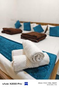 Ένα ή περισσότερα κρεβάτια σε δωμάτιο στο Hotel Shree Govind Palace