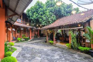 Zahrada ubytování RedDoorz Syariah near Akmil Magelang