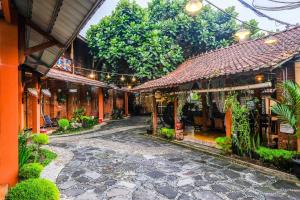 Zahrada ubytování RedDoorz Syariah near Akmil Magelang