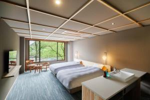 Voodi või voodid majutusasutuse Hotel Park toas