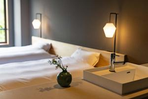Voodi või voodid majutusasutuse Hotel Park toas