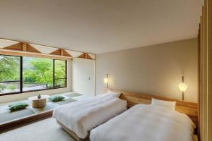 Voodi või voodid majutusasutuse Hotel Park toas