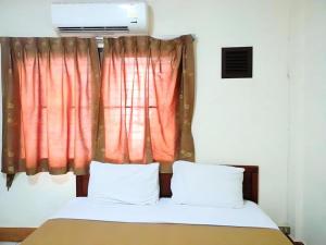 Postel nebo postele na pokoji v ubytování Souvanna 2 Hotel + 74 fotografií