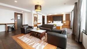 Гостиная зона в B2 Bangkok Srinakharin Boutique & Budget Hotel +100 фотографий