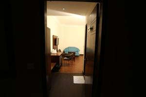 Posezení v ubytování Hotel Kohinoor Palace, Ludhiana