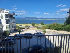 a balcony with a view of a parking lot at Pockovi Apartments in Star Dojran