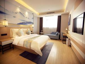 Postel nebo postele na pokoji v ubytování VX Kaifeng Jinming Avenue Songcheng Road Hotel + 75 fotografií