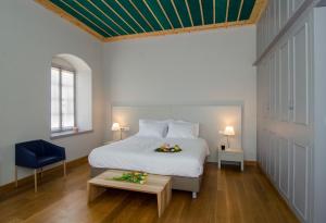 Postel nebo postele na pokoji v ubytování Hotel Archontiko Anyfanti