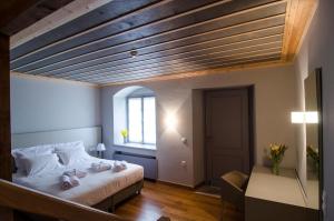 Postel nebo postele na pokoji v ubytování Hotel Archontiko Anyfanti