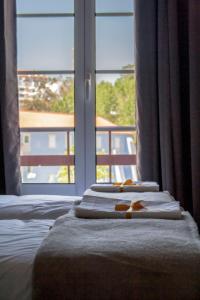 Cama ou camas em um quarto em Most Art Boutique Hostel