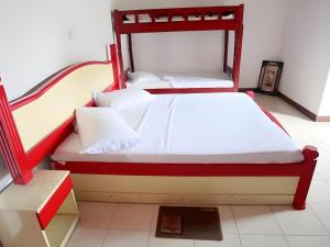 Voodi või voodid majutusasutuse Hotel Uva Rest Sanasta toas