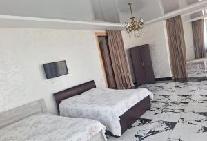 Letto o letti in una camera di NINO