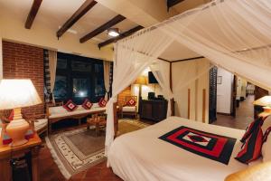 Letto o letti in una camera di The Dwarika's Hotel
