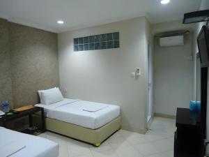Katil atau katil-katil dalam bilik di Flamengo Hotel +76 gambar