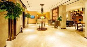 Yitel Collection Hangzhou Binjiang Jiangnan Avenue Baolongcheng的电视和/或娱乐中心