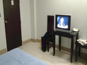 TV a/nebo společenská místnost v ubytování Amarin Grand Hotel + 72 fotografií